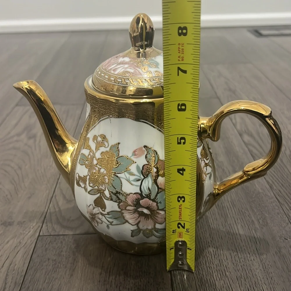 Elegant glass decorative floral teapot